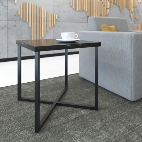 Side table with black frame, next to grey a sofa